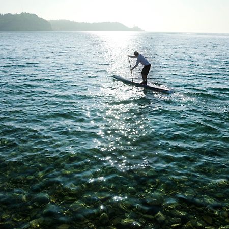 Hotel Slovenija - Terme & Wellness Lifeclass Portorož Extérieur photo Stand-up paddle boarder on Lake Balaton