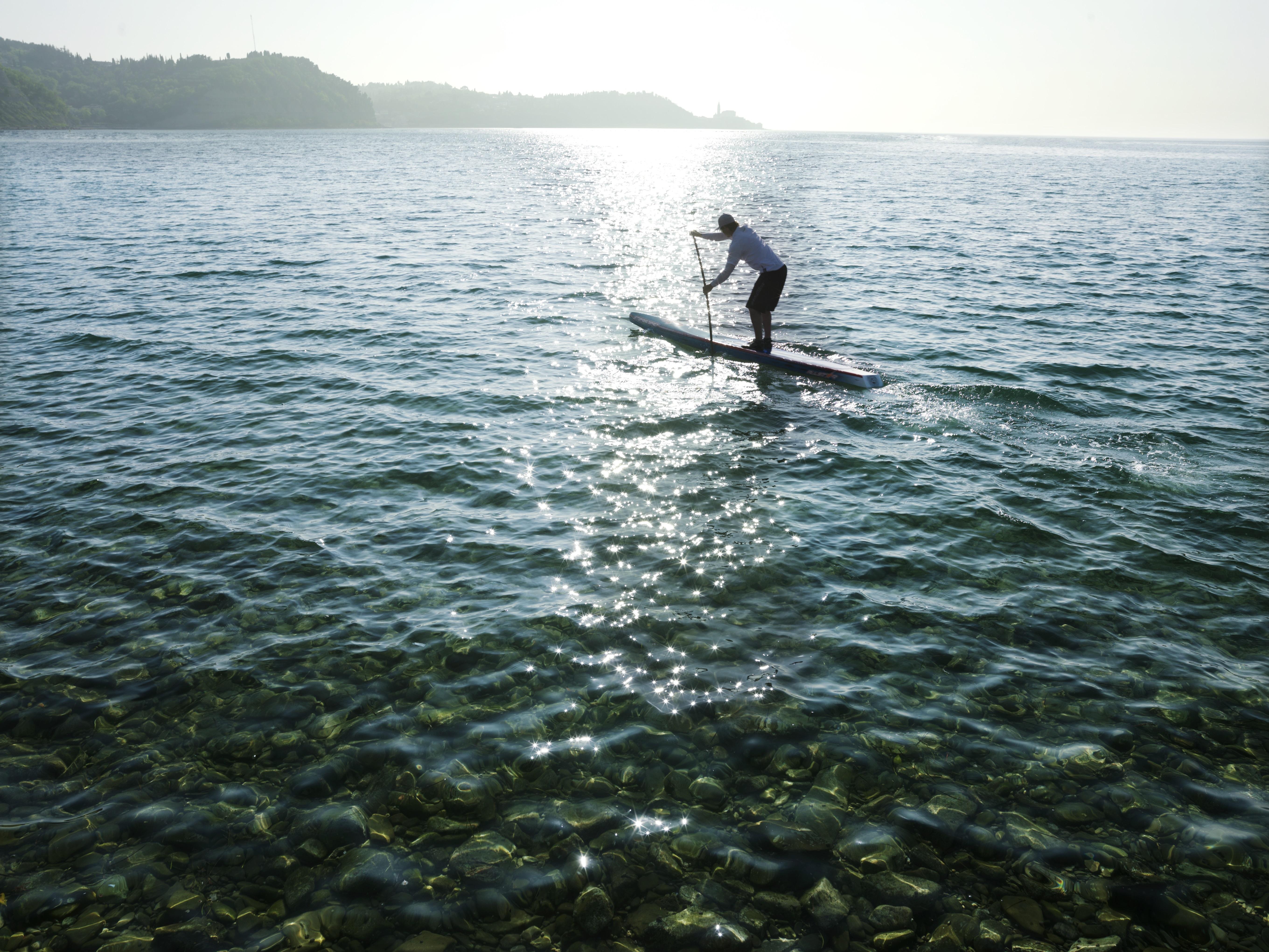 Hotel Slovenija - Terme & Wellness Lifeclass Portorož Extérieur photo Stand-up paddle boarder on Lake Balaton